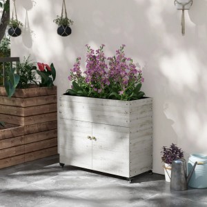 Weißes Outsunny Hochbeet aus Tannenholz mit Schrankfach und Rädern, bepflanzt mit lila Blumen.