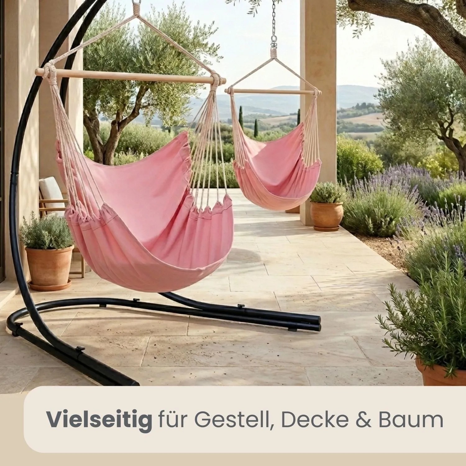 AMANKA XXL Hängesessel rosa auf schwarzem Gestell, mit Holzstab, im Garten. Vielseitig für drinnen & draußen.