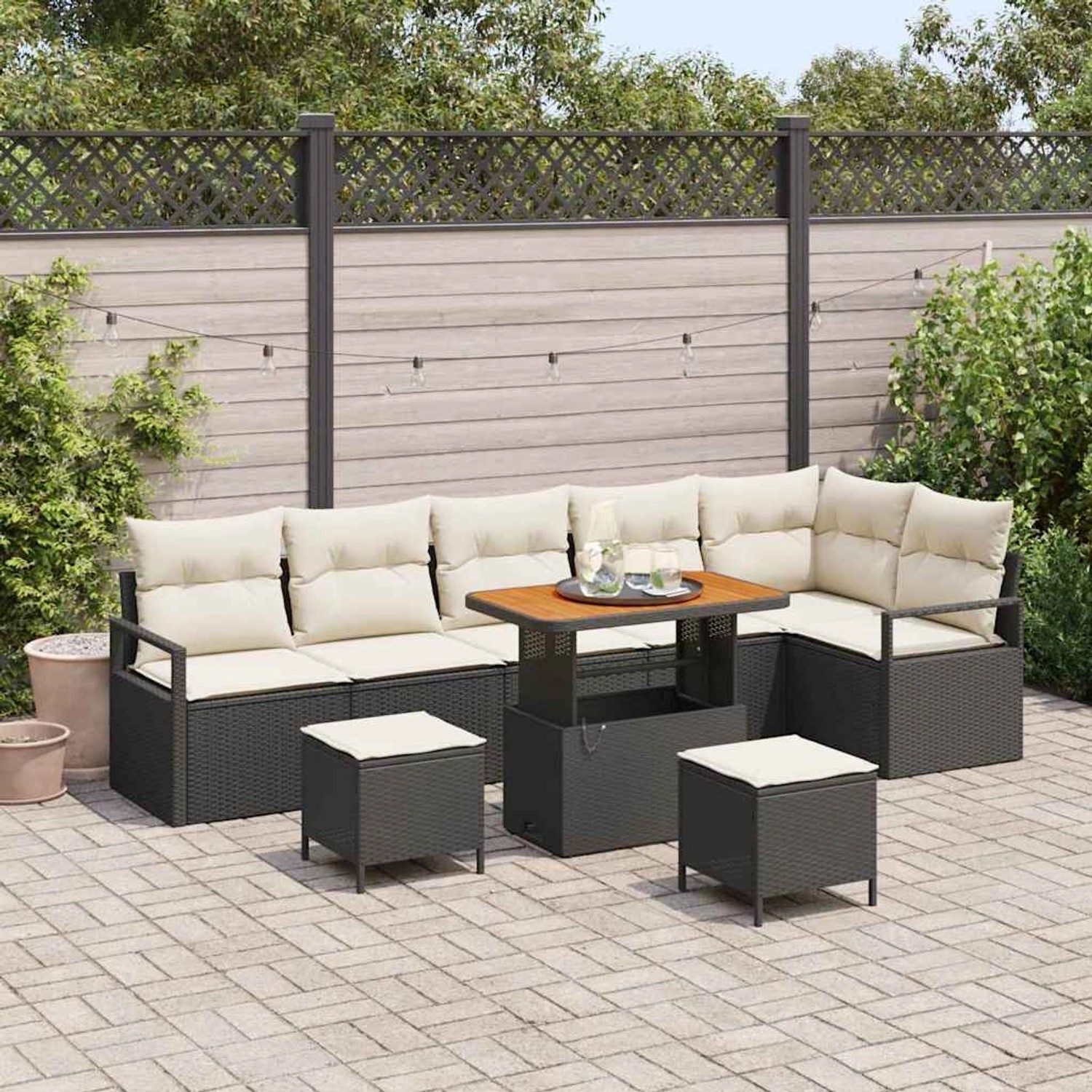 Schwarzes 9-teiliges vidaXL Garten-Sofa-Set aus Poly Rattan mit Tisch und Kissen.