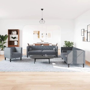 Dunkelgraues 3-tlg. Chesterfield Sofa-Set mit Nackenrollen im Wohnzimmer.