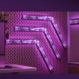 Govee Gaming-Wandleuchten 4+1 H6063 im Gaming-Setup mit violetter Beleuchtung.