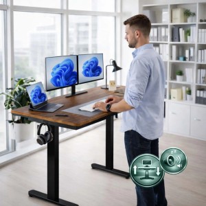 Mann arbeitet stehend an elektrisch höhenverstellbarem Schreibtisch mit Holzplatte, schwarzem Stahlgestell im Büro.