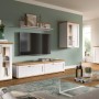 Weißes Wandboard Mirano im Landhausstil, 110 cm, mit gekälkter Lärche-Optik, schwebend an grüner Wand.