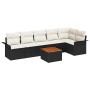 7-teiliges Gartensofa-Set von vidaXL aus schwarzem Poly Rattan mit Akazientisch und cremefarbenen Kissen.