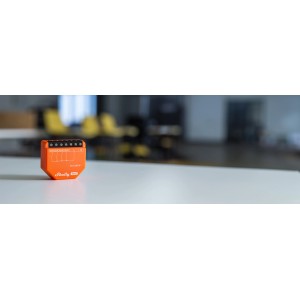 Shelly i4 Gen3 Relaismodul in Orange für Hausautomation, Unterputzmontage.