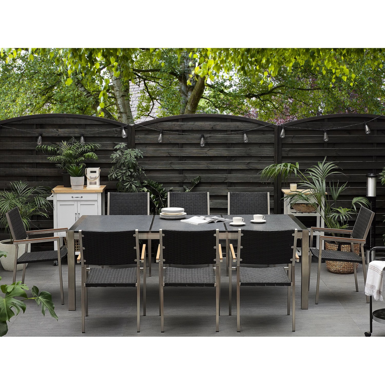 Beliani Gartentisch Set GROSSETO, graphitgrau, mit Tisch und 8 Stühlen aus Rattan und Stein.