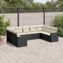 Schwarze 9-tlg. Garten-Sofagarnitur aus Poly Rattan mit cremefarbenen Kissen.