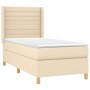 Cremefarbenes vidaXL Boxspringbett 100x200 cm mit Matratze und Kopfteil.