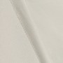 Detailaufnahme des cremefarbenen Balkonfächers, Textilstruktur und Naht sichtbar.