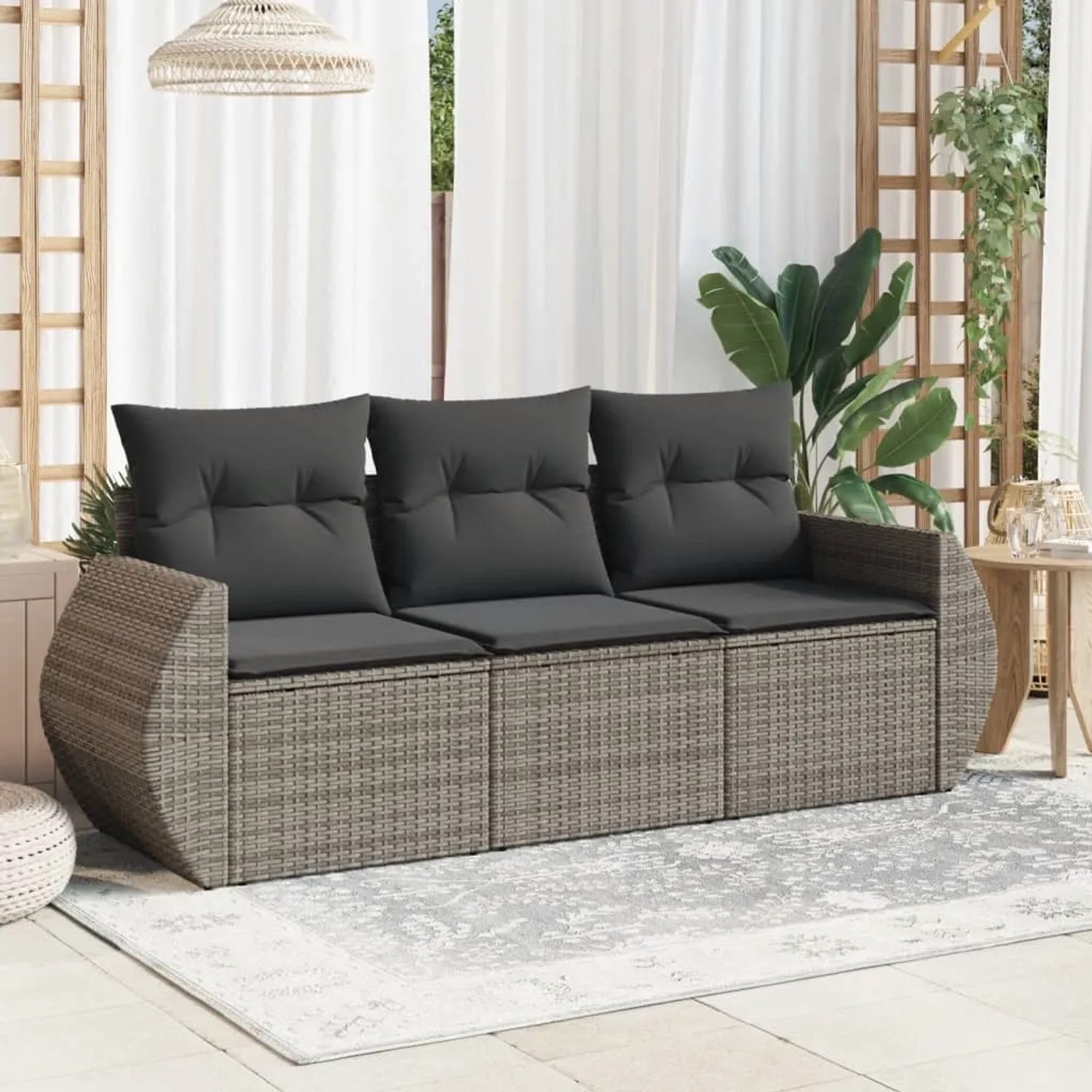 Graue vidaXL Garten-Sofagarnitur aus Rattan mit dunklen Kissen für Terrasse und Garten.