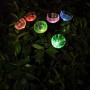 Globo Deko-Solarleuchten mit RGB-Lichtspiel und Blütenmotiv im Garten.