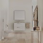Modernes Bad mit Ideal Standard Waschtischarmatur Cerafine D H105 Chrom an weißem Waschtisch.