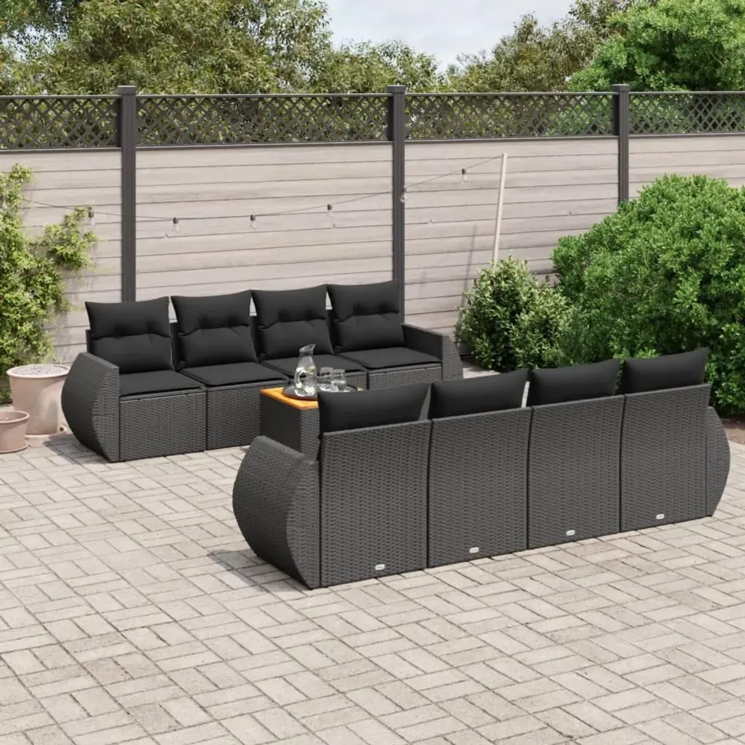 Schwarze 9-tlg. vidaXL Garten-Sofagarnitur aus Poly Rattan mit Kissen und Tisch.