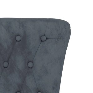 Detailaufnahme: Dunkelgrauer Polsterstuhl mit Knopfheftung und Samtbezug.