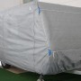Graue Wohnwagen Abdeckhaube Größe L von Garden Pleasure schützt vor Wettereinflüssen und Schmutz.