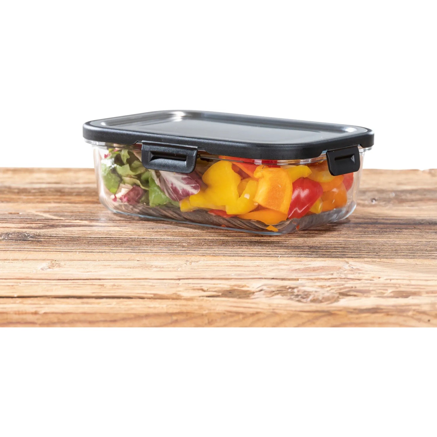 Wenko Glas Frischhaltedose Steel Black Outdoor Kitchen 1 l, gefüllt mit Salat und Paprika.