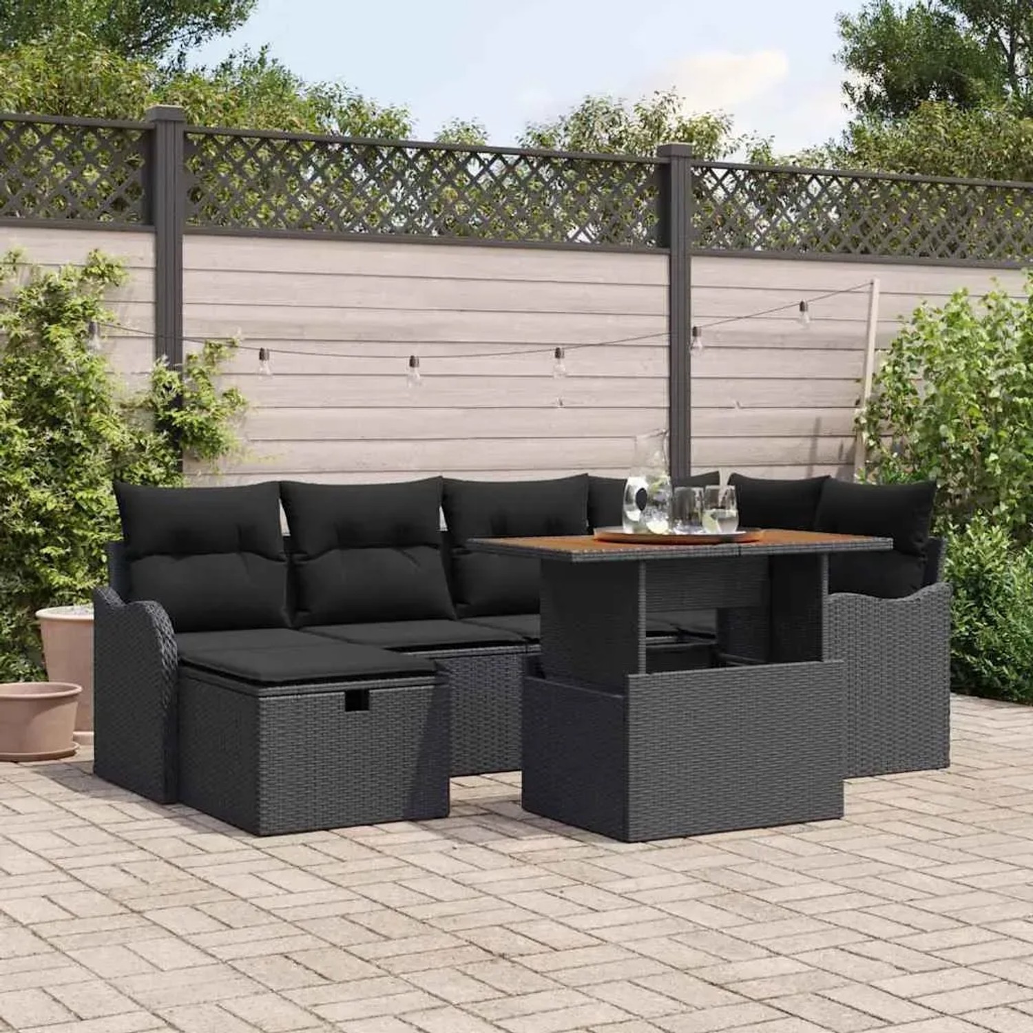 Schwarzes 7-tlg. vidaXL Garten-Sofa-Set aus Poly Rattan mit Tisch für Garten oder Terrasse.