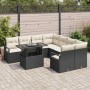 Schwarzes 9-teiliges Garten-Sofa-Set aus Poly Rattan mit Kissen.