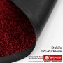 Rote Floordirekt Schmutzfangmatte Space 205. Detailansicht des schwarzen, rutschfesten TPE-Rückens für Stabilität.