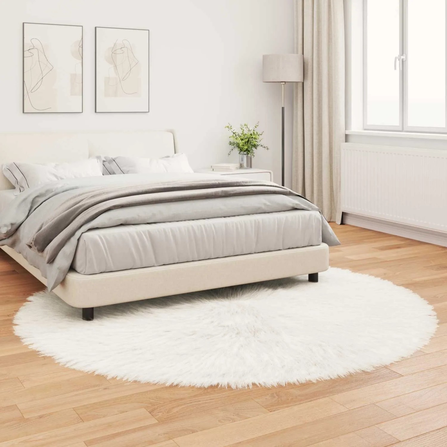 Weißer, runder vidaXL Kunstschaffell Teppich (Ø 200 cm) im Schlafzimmer.