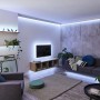 Wohnzimmer mit Paulmann MaxLED 250 LED-Streifen Basis-Set für indirekte Beleuchtung.
