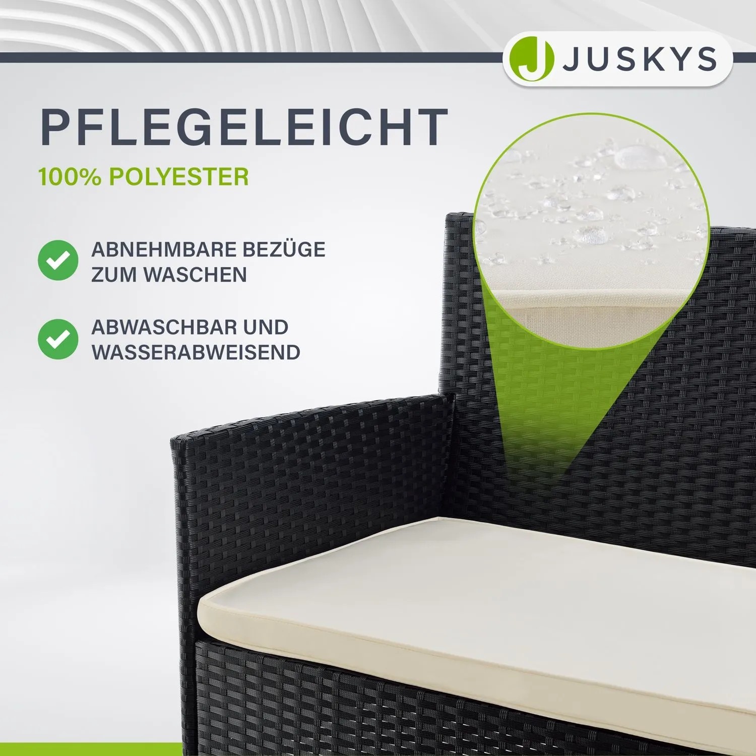 Detailaufnahme: Schwarzer Polyrattan Gartenstuhl mit cremeweißem, wasserabweisendem Sitzkissen.