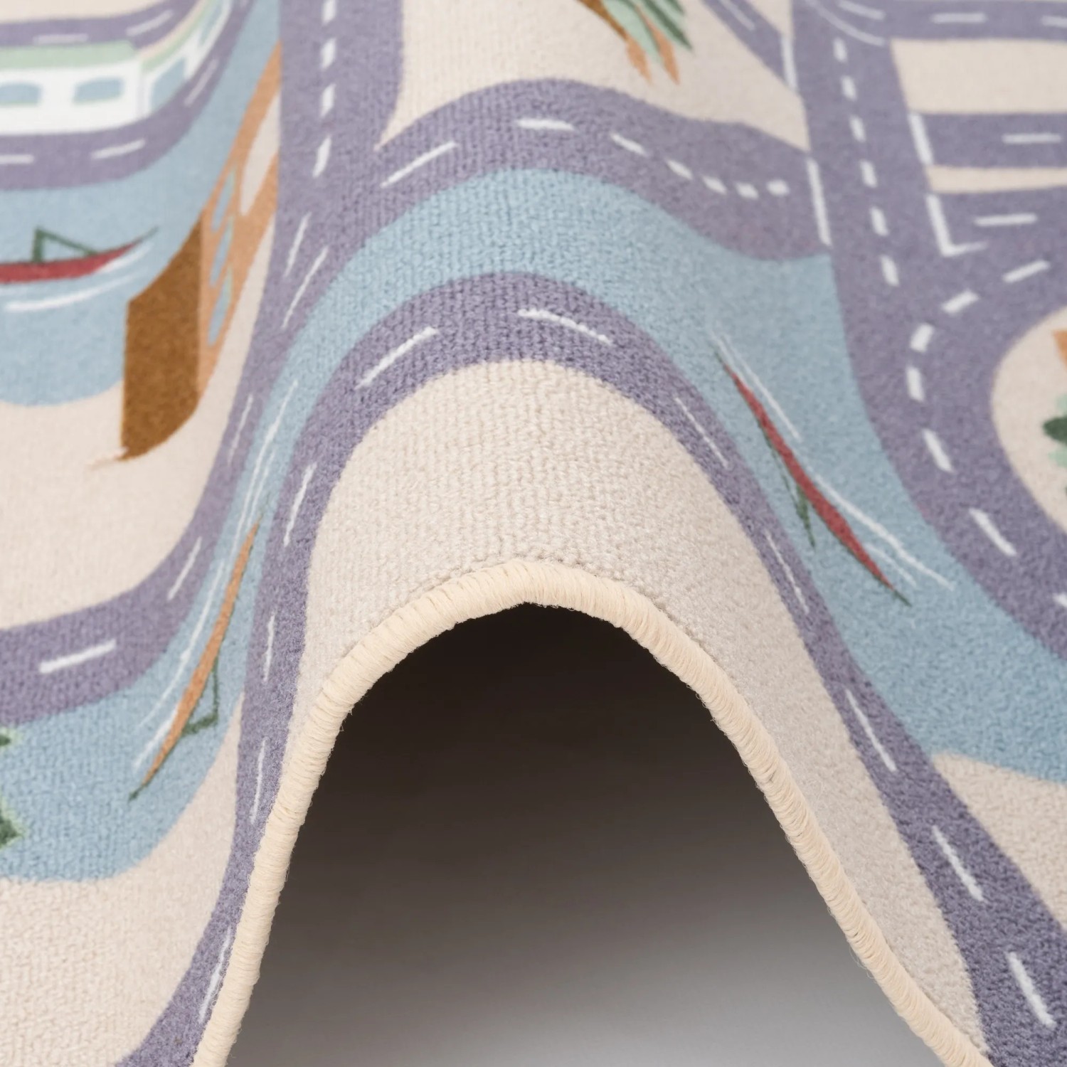 Detailansicht: Snapstyle Kinder Spielteppich beige mit Straßenmuster, 140x200cm.