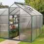 Vitavia Gewächshaus Triton 3800 Smaragd mit Fundament, bepflanzt mit Regalen im Garten.