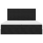 Schwarzes vidaXL Bett (180x200 cm) mit LED-Leisten und Samtbezug.