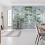 Komar Fototapete Orangerie im Wohnraum, detailreiche Pflanzen- und Glashaus-Optik.