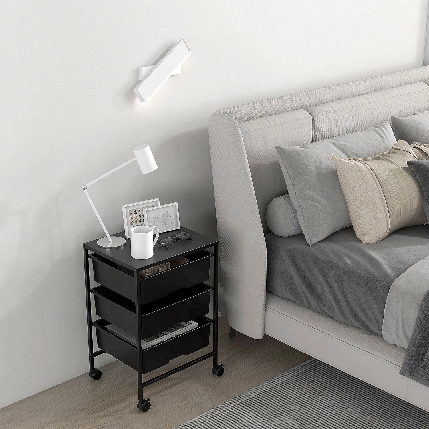 Schwarzer HOMCOM Rollwagen mit 3 Ablagen aus Stahl und Kunststoff, als Bürocontainer oder Beistelltisch.