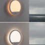 Weiße, runde Paulmann LED-Außendeckenleuchte Lamina mit Bewegungssensor und warmweißem Licht.