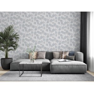 Wohnzimmer mit weißer Marburg Vliestapete GZSZ mit floralem Blattmotiv.