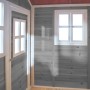 Innenansicht: Graues EXIT Loft 500 Holzspielhaus mit Fenster und Holzwänden.