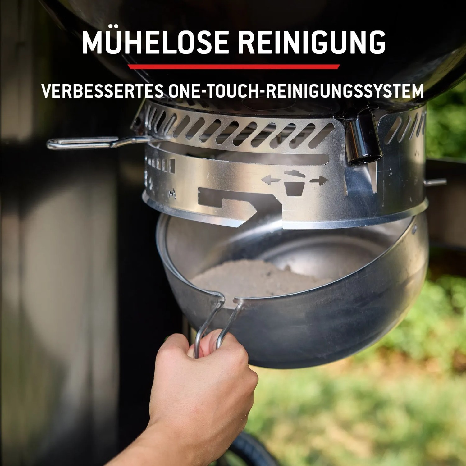 Detailaufnahme des Weber Holzkohlegrills Performer: One-Touch Reinigungssystem für mühelose Ascheentsorgung.