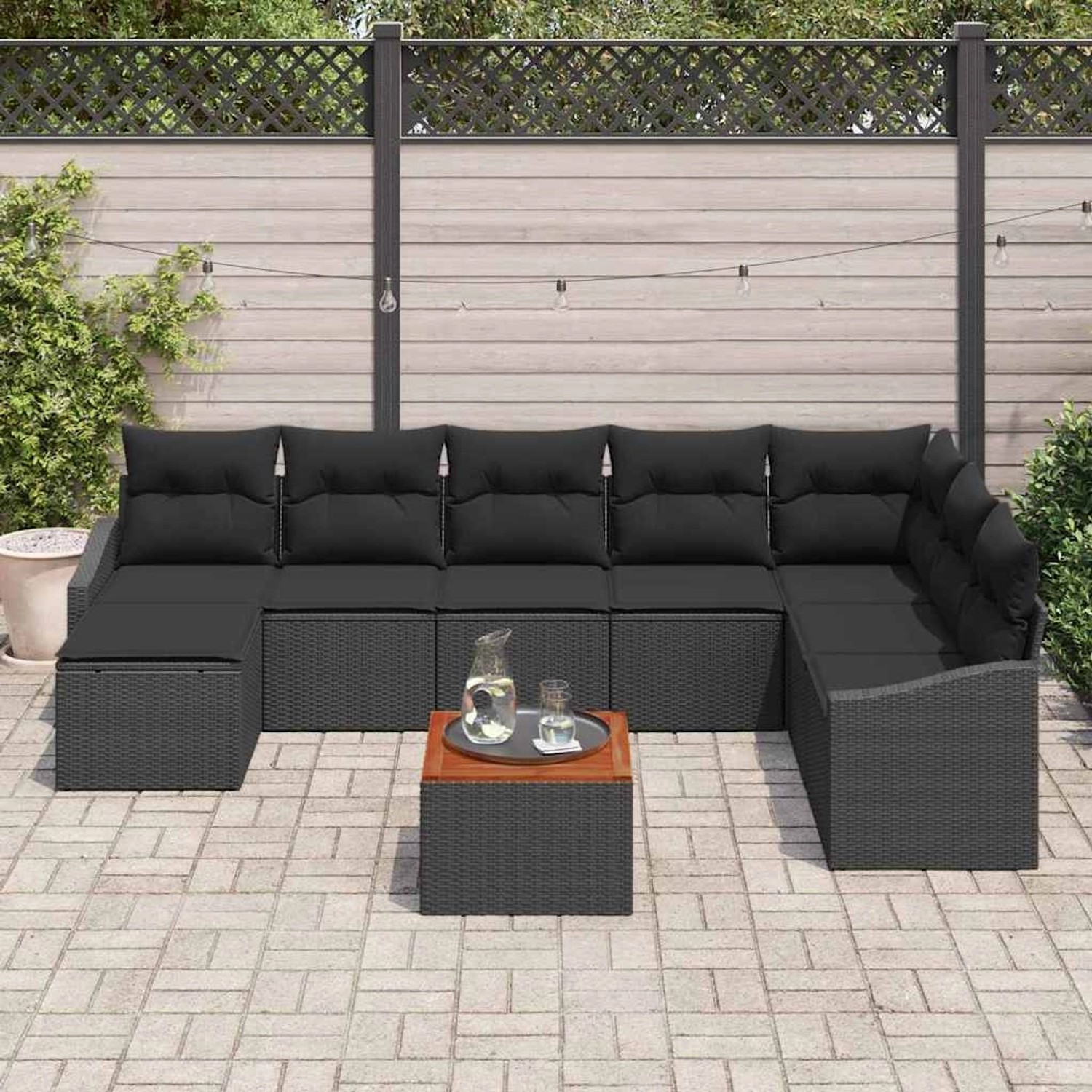 Schwarzes 9-teiliges Garten-Sofa-Set aus Poly Rattan mit Kissen und Tisch von vidaXL.