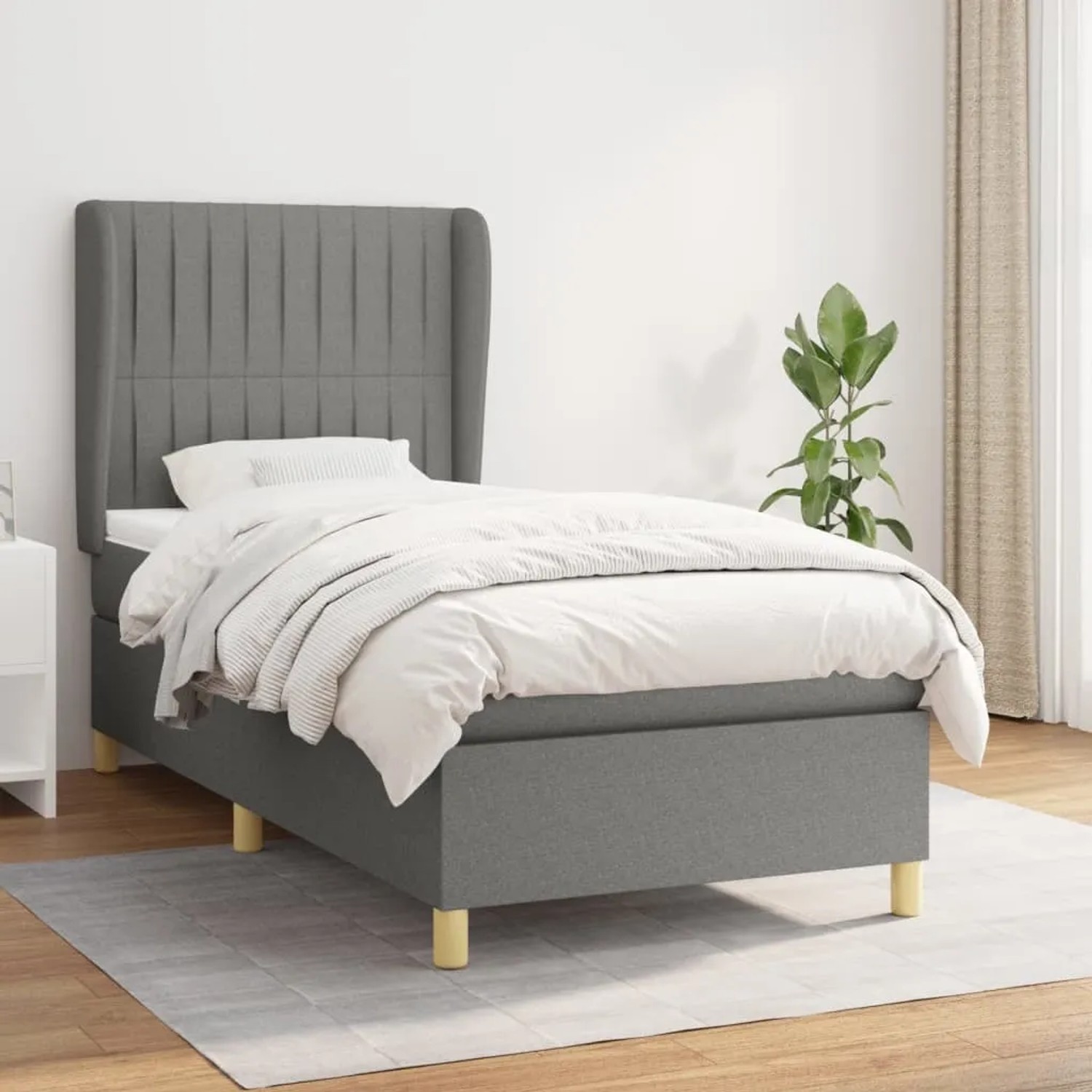 Dunkelgraues vidaXL Boxspringbett 90x190 cm mit Stoffbezug und Matratze.