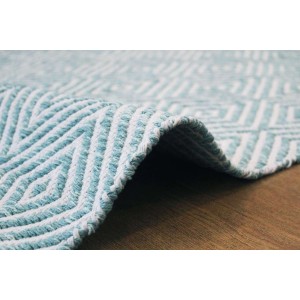 Türkiser Baumwollteppich (160x230 cm) mit Rautenmuster. Moderner Kurzflorteppich für Wohnräume.