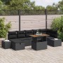 Schwarzes 8-teiliges Garten-Sofa-Set aus Poly Rattan mit Tisch und Kissen für Terrasse und Garten.