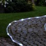 Jardinion Solarlichterkette LED, 7m, transparent, kaltweiß leuchtend im Garten.