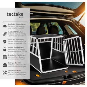 Schwarze Tectake Hundetransportbox aus Aluminium mit schräger Rückwand im Kofferraum.