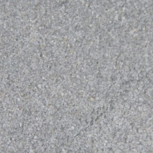 Terralith 2k Pflasterfugenmörtel in Granit Grau. Körnige Textur des Mörtels für PKW-befahrene Fugen.
