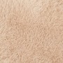Beiger Shaggy Hochflorteppich NAVARRA 60x100 cm aus Polyester. Detail der weichen, langen Fasern.