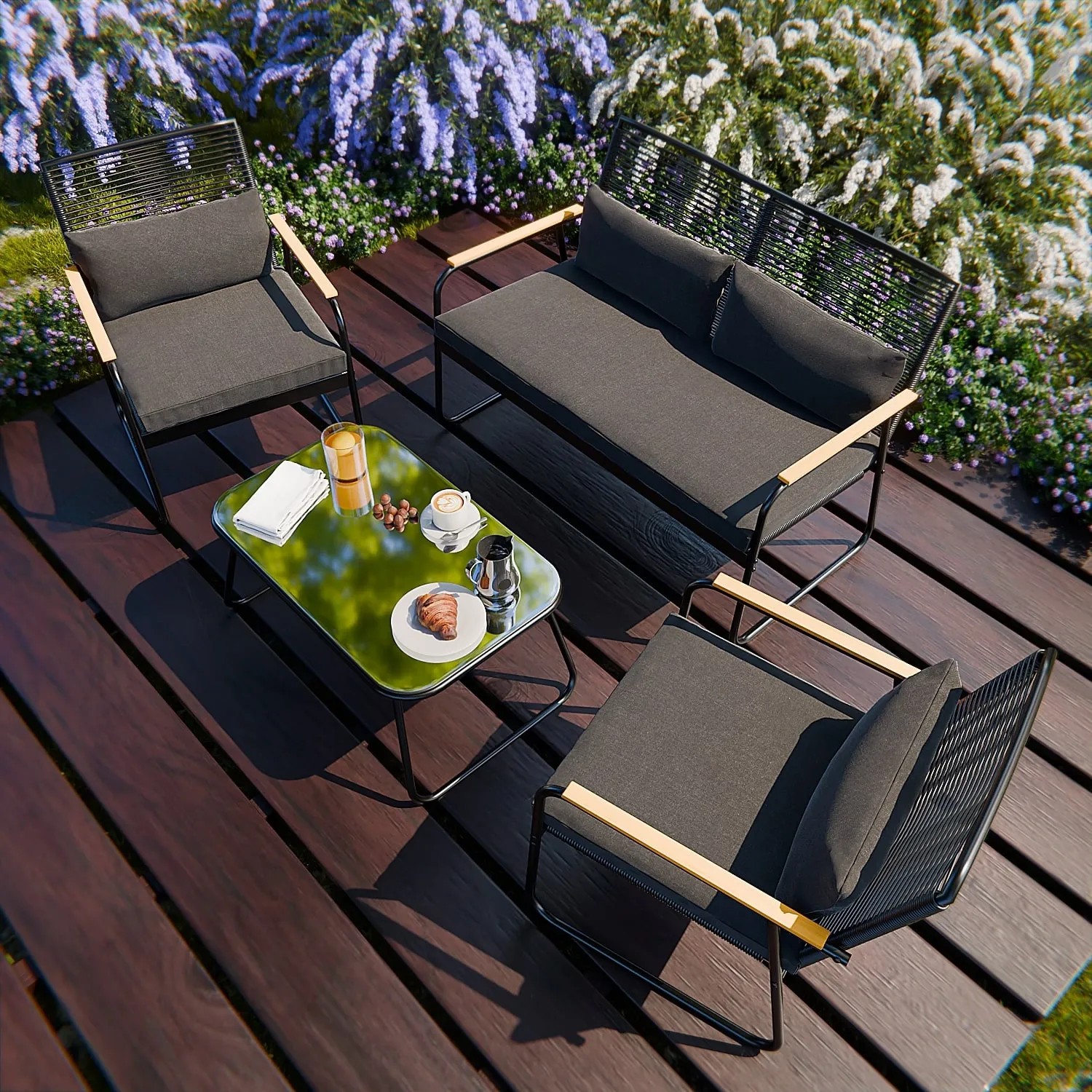 4-teiliges GARMIO Polyrattan Gartenmöbel Set mit Sitzbank, Stühlen und Glastisch.