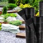 Aquagart Bodengewebe, 16m², Unkrautfolie 100g, 1,65m breit, schwarz, auf Rollen vor Garten.