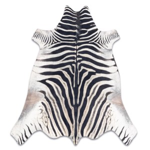 Kunstfell Teppich in Tierfelloptik mit Zebra-Muster, schwarz-weiß, unregelmäßige Form. Für Ihr Zuhause.