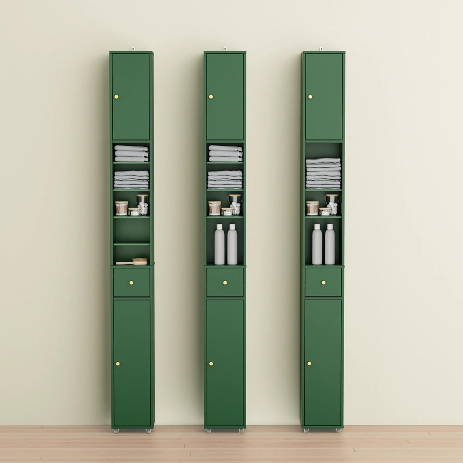 Drei grüne SoBuy Bad Hochschränke BZR34-II-SY mit Regalböden, Schublade und Tür vor beiger Wand.