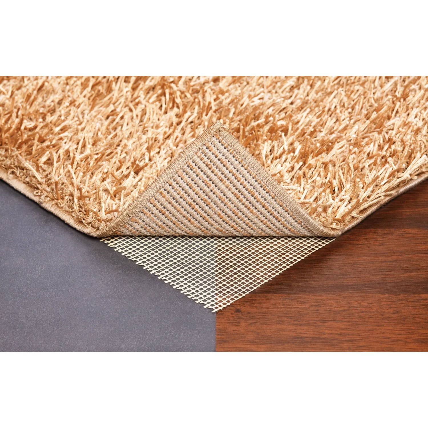 OBI Teppichunterlage 80x130 cm unter Teppich auf Holzboden und Steinboden.