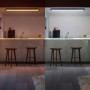 Smarte Philips Hue LED-Panelleuchte Aurelle, 120x30 cm, in Schwarz mit warmweißem und kaltweißem Licht.