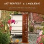 Rostikal Willkommen Stele Pusteblume, 71 cm Cortenstahl Gartendeko mit Edelrost Patina im Blumenbeet.